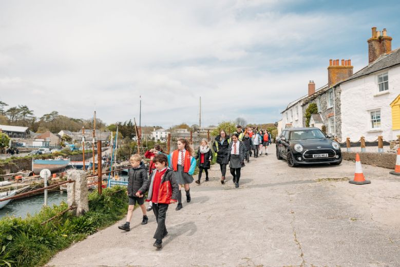 Children on an outing learning about their locality