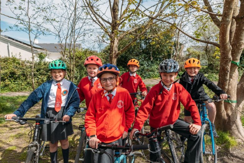 children on theor school bikes